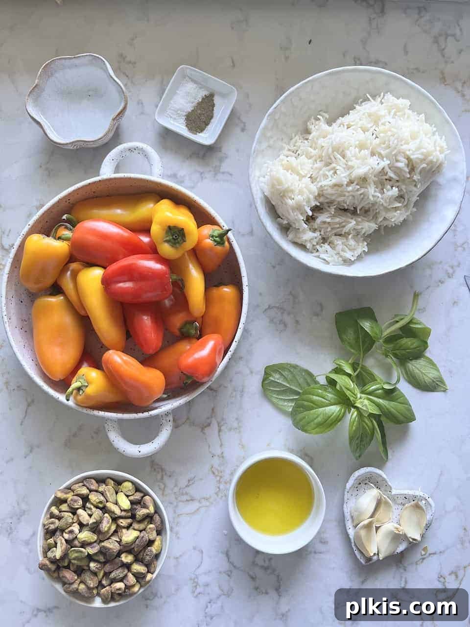 Savory Stuffed Roasted Sweet Peppers 3 ingredients for Stuffed Roasted Sweet Peppers against a white background