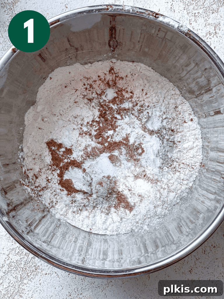 Fluffy Autumn Spiced Vegan Pumpkin Scones 4 process shot of mixing ingredients together in a bowl