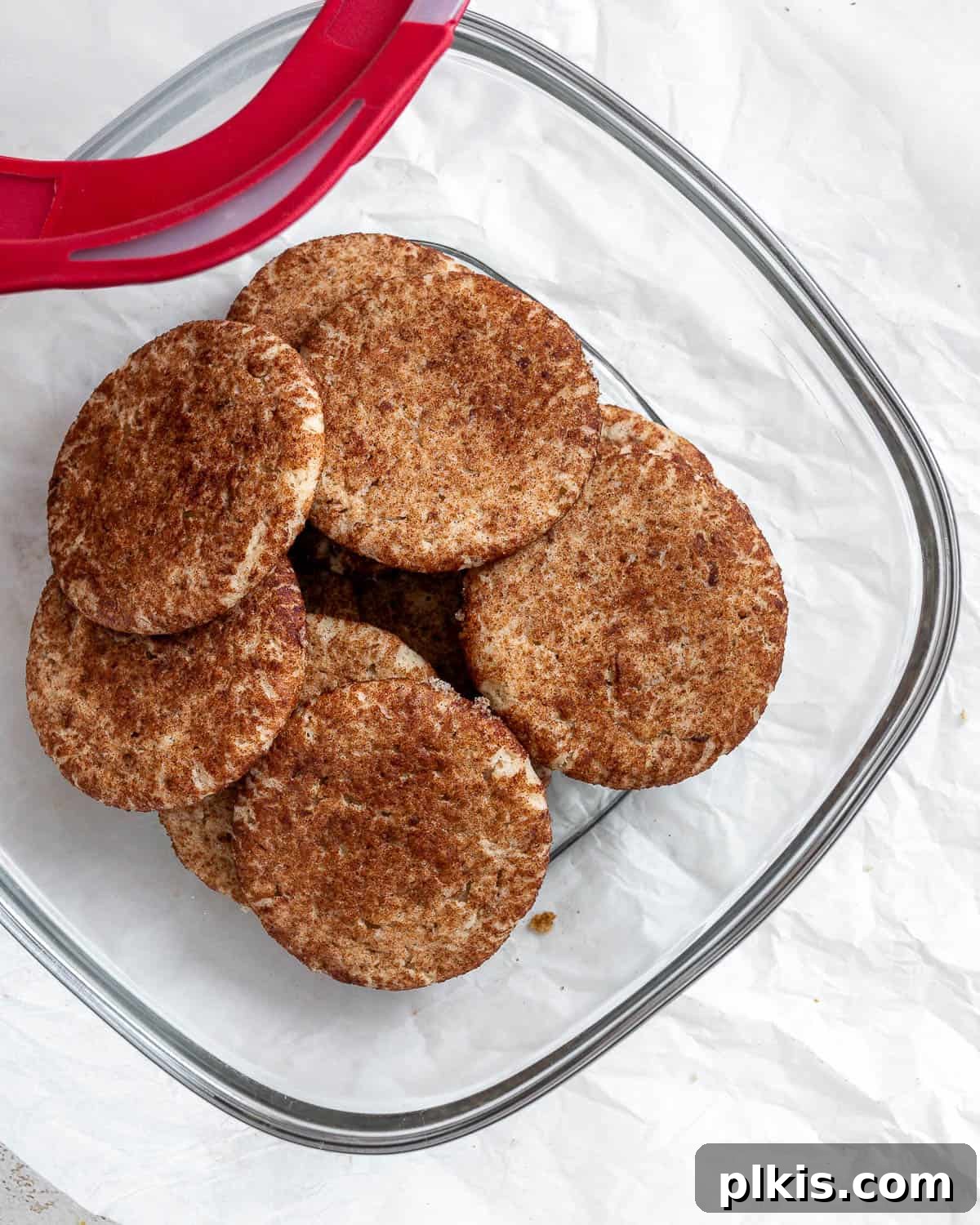 Effortless Vegan Snickerdoodle Delights 11 completed Easy Vegan Snickerdoodles in a container