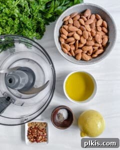 Fresh Parsley Potatoes 5 Process image showing all the fresh ingredients for parsley potatoes laid out against a white background.