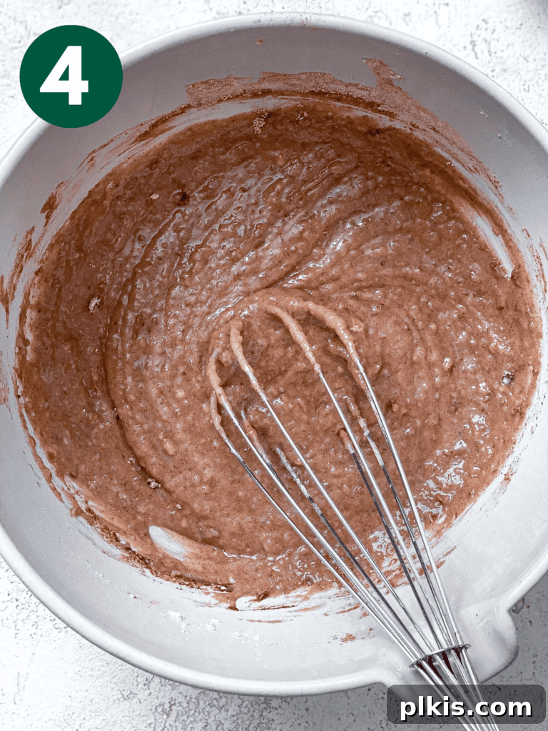 Plant-Based Pear Bliss 7 process shot showing whisking of ingredients in bowl