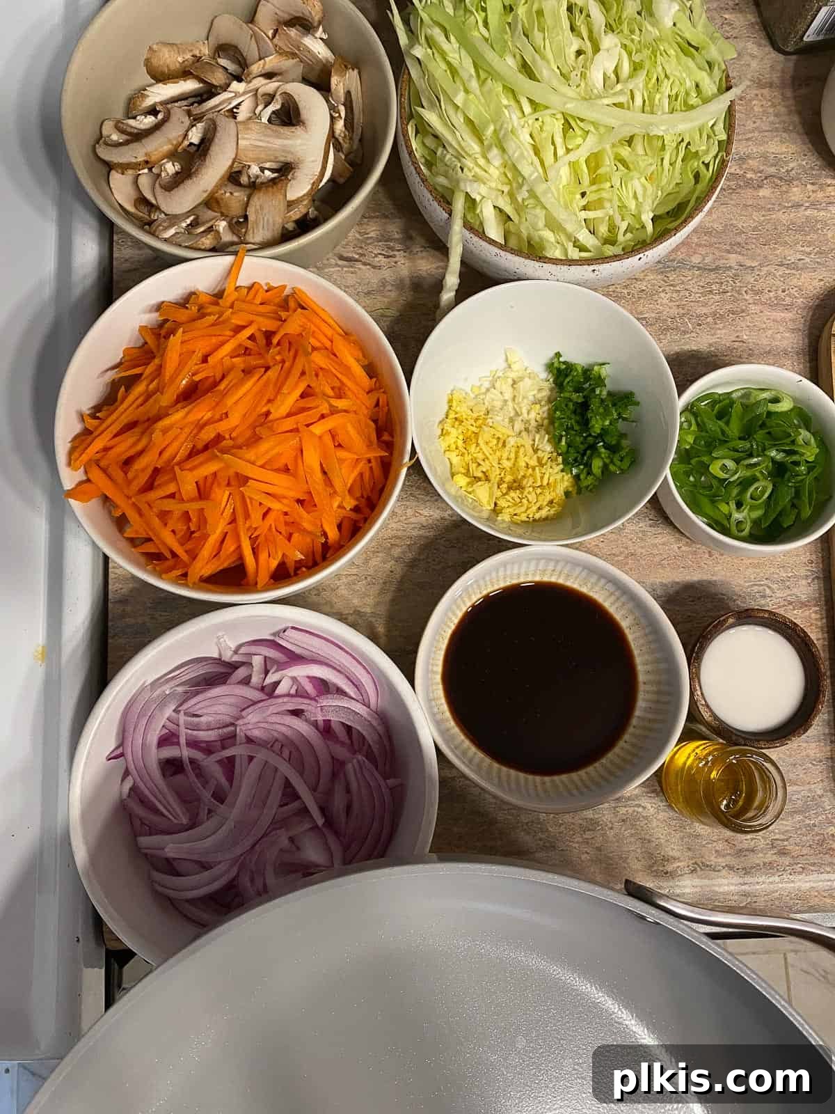 Vibrant Moo Shu Medley 4 All ingredients for Moo Shu Vegetable meticulously measured and arranged in individual bowls, demonstrating perfect mise en place before cooking.