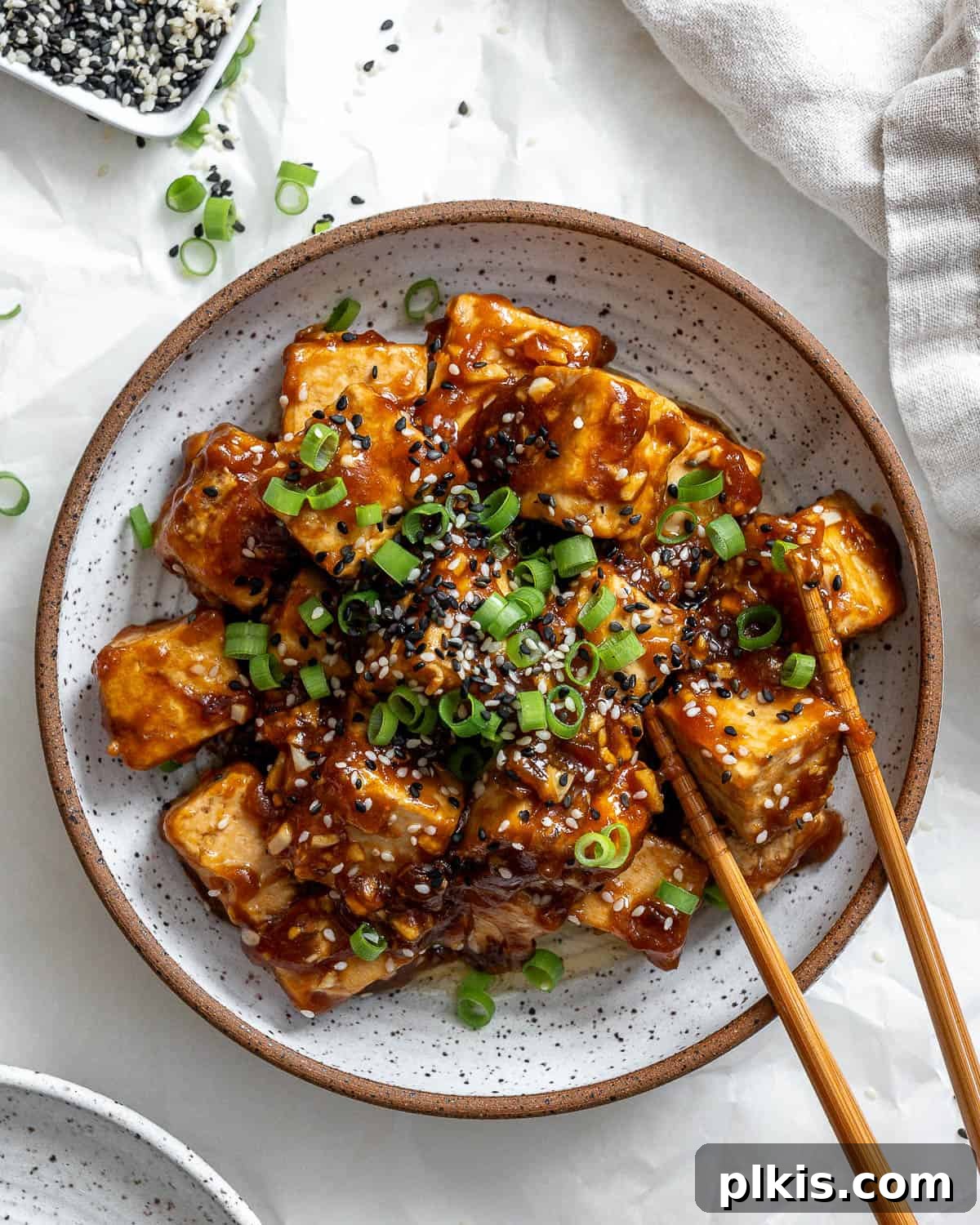 Golden Sesame Tofu 11 Close-up of completed Sticky Sesame Tofu on a plate, showing the rich sauce