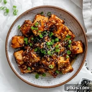 completed Sticky Sesame Tofu on a plate