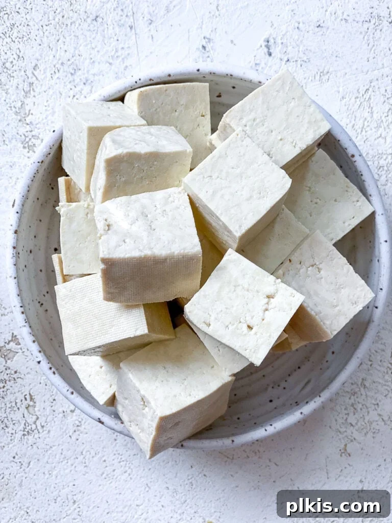 Golden Sesame Tofu 4 cubed tofu in a bowl