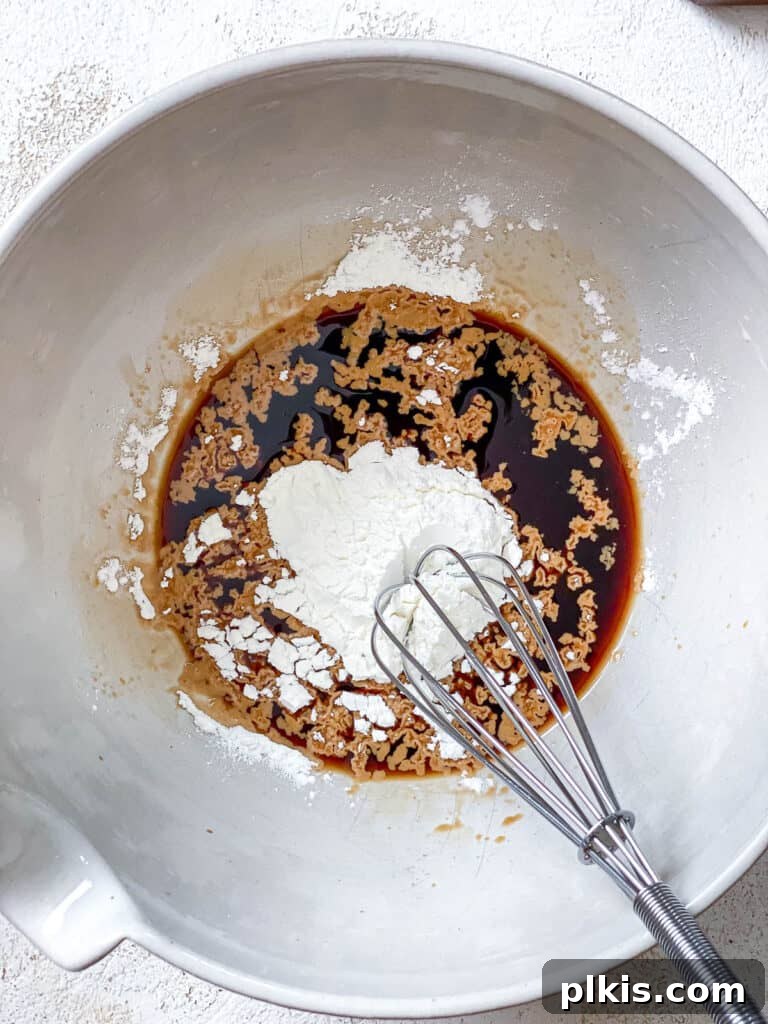 Golden Sesame Tofu 5 process shot of mixing ingredients for tofu coating in a bowl