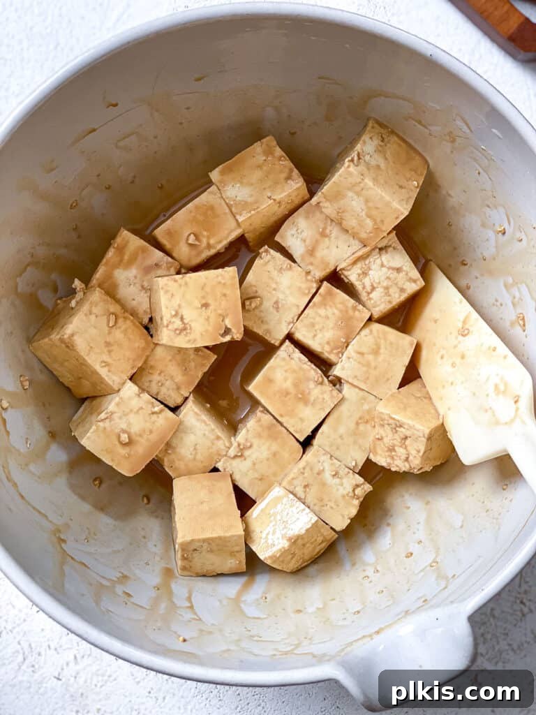 Golden Sesame Tofu 8 process shot of fully coated tofu in a bowl