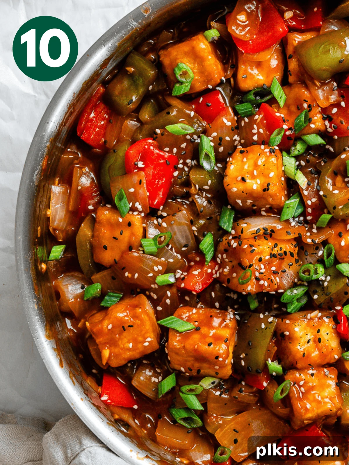 Golden Sweet and Sour Tofu 13 Process shot showing the fully cooked sweet and sour tofu dish simmering in the pan, ready to be served.