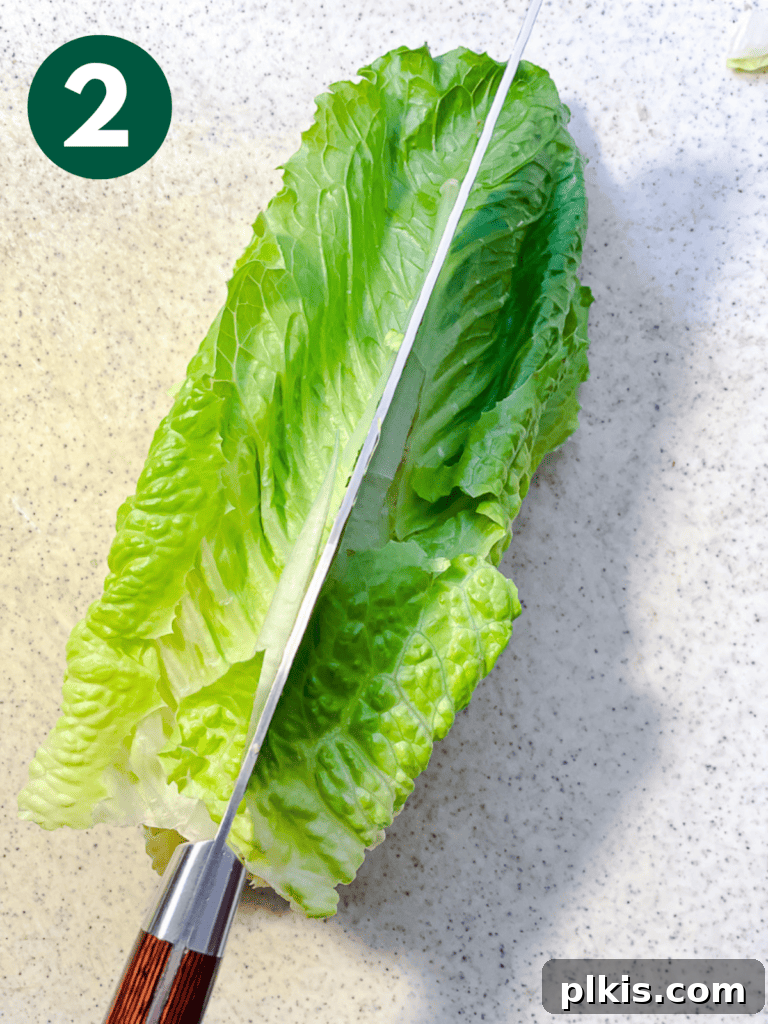 Ultimate Vegan Caesar 5 process shot of slicing lettuc