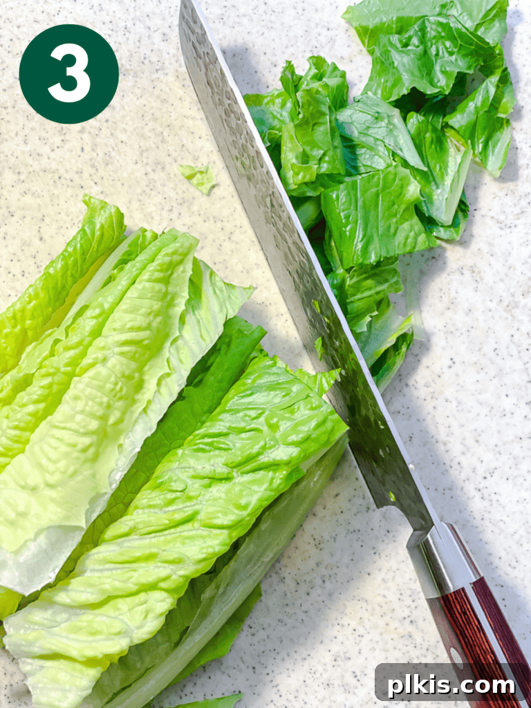 Ultimate Vegan Caesar 6 process shot of slicing lettuc