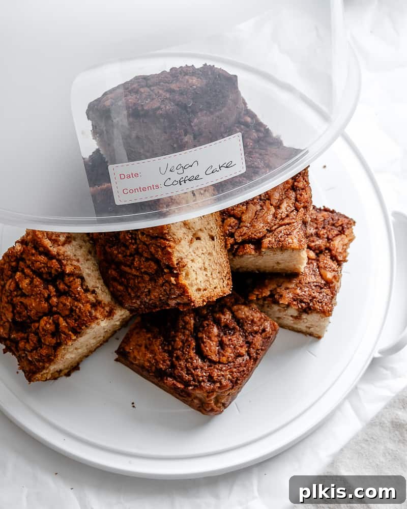 Irresistible Vegan Coffee Cake 13 A whole vegan coffee cake stored in an airtight container, ready for preservation.