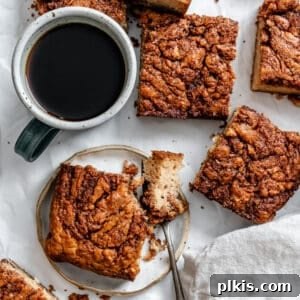 completed Vegan Coffee Cake in squares on white surface