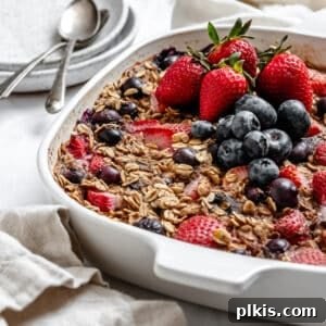 Completed Vegan Baked Oatmeal with Mixed Berries in a baking dish