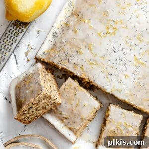 overhead view of a sliced lemon poppy seed cake.