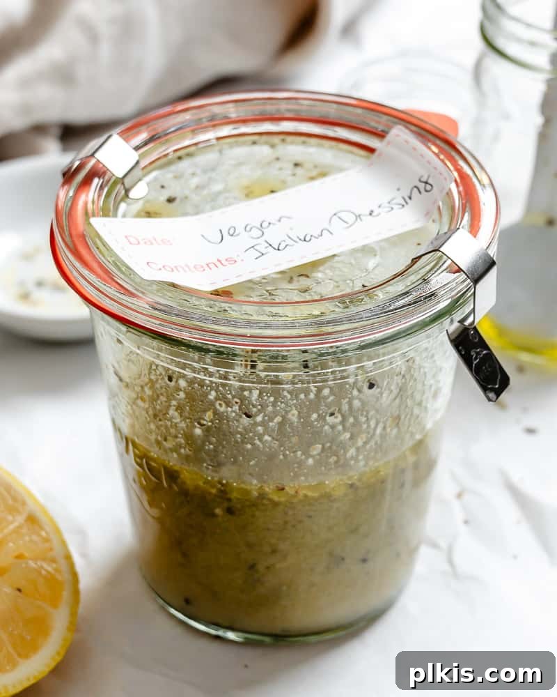 3-Minute Plant-Based Italian Dressing 5 A charming glass jar filled with freshly made homemade vegan Italian dressing, ready to be served.