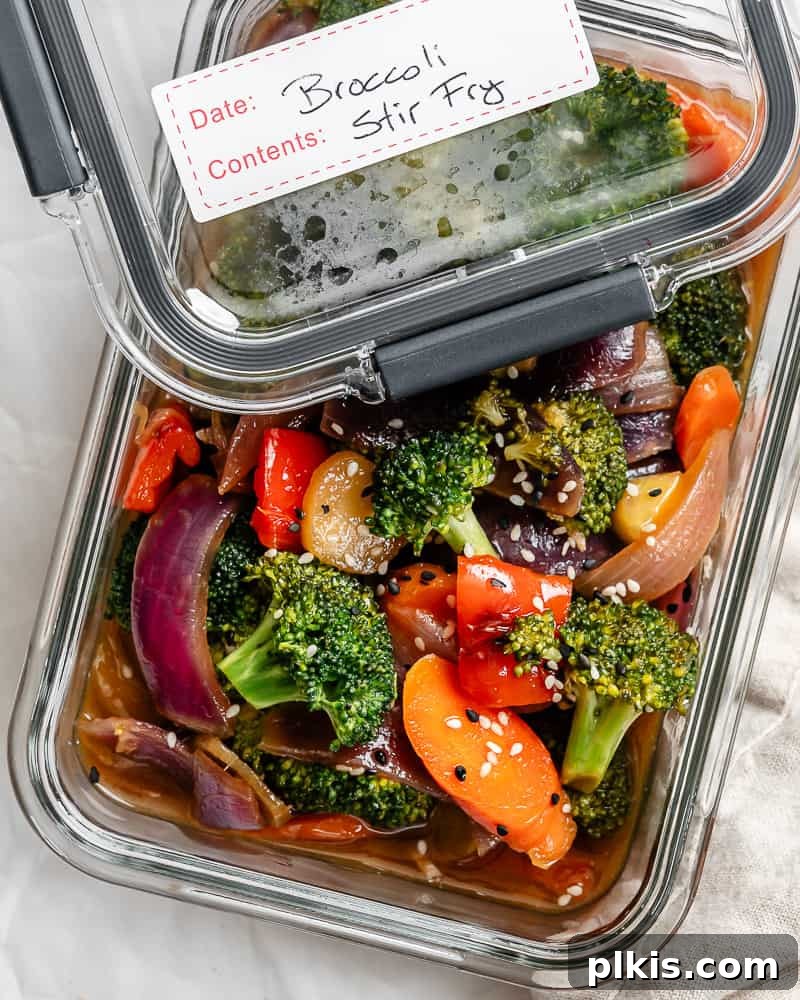 Completed Easy Garlic Broccoli Stir-Fry stored in a glass meal prep container.