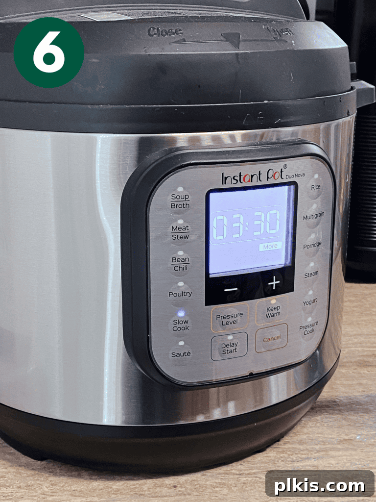 Cozy Slow Cooker Spiced Pumpkin Bisque 9 process shot showing instant pot settings