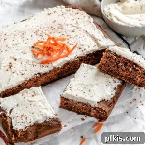 completed Vegan Carrot Cake on a white surface