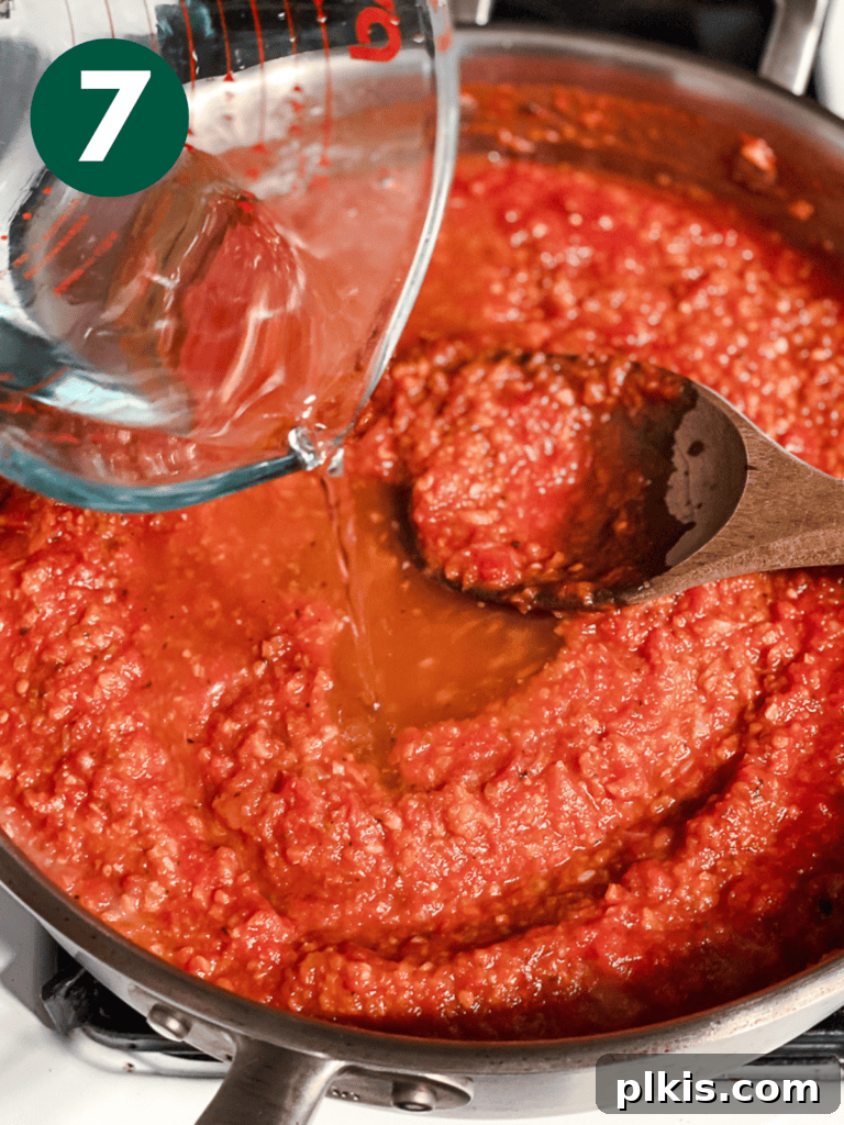 Vibrant Vegan Marinara 10 process shot showing water being added to pot