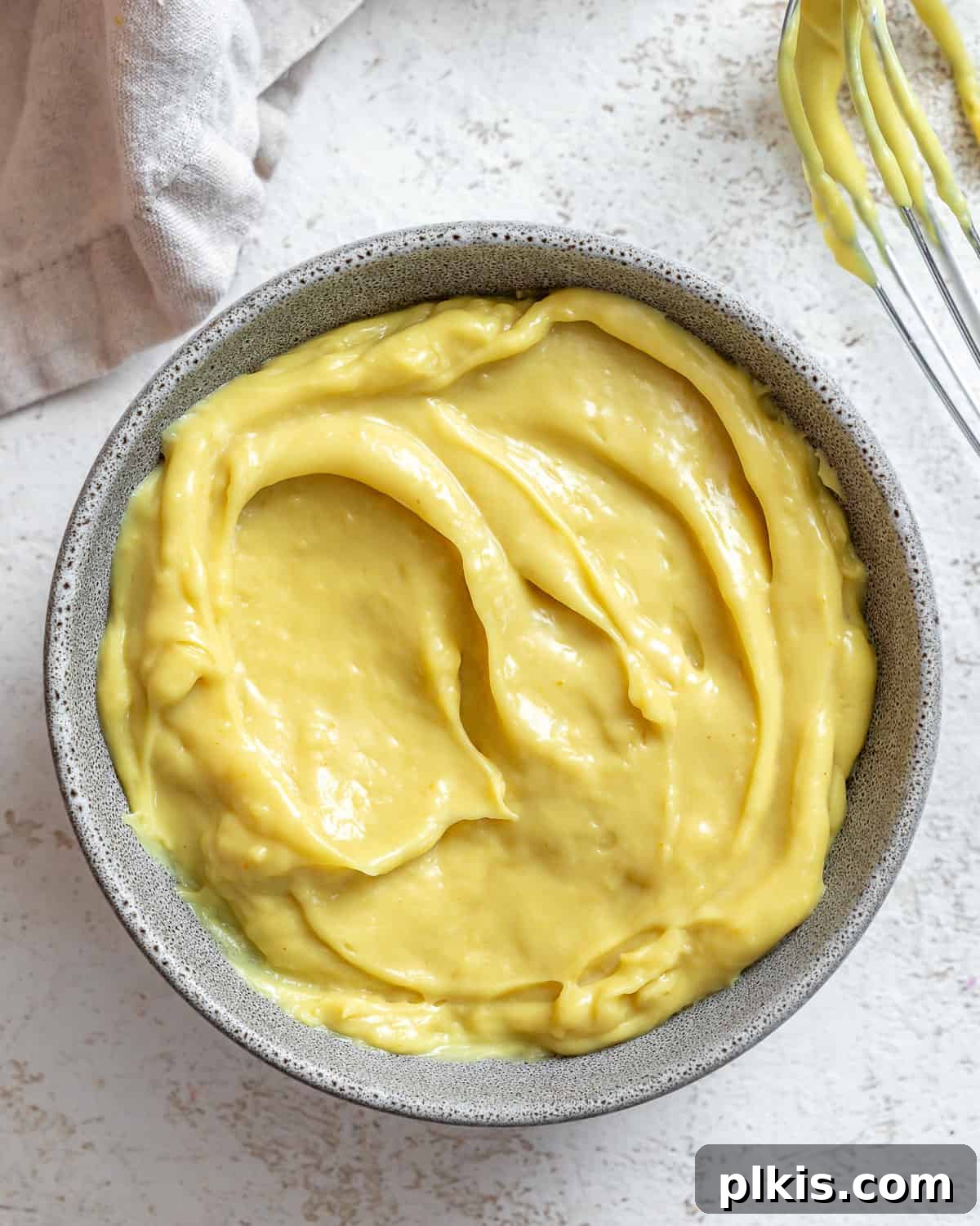 Decadent Vegan Custard 2 A bowl of rich, yellow vegan custard, perfectly smooth and inviting.