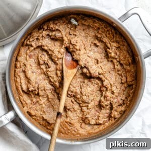 Completed Vegan Refried Beans [Frijoles Refritos] in a pot, ready to serve.