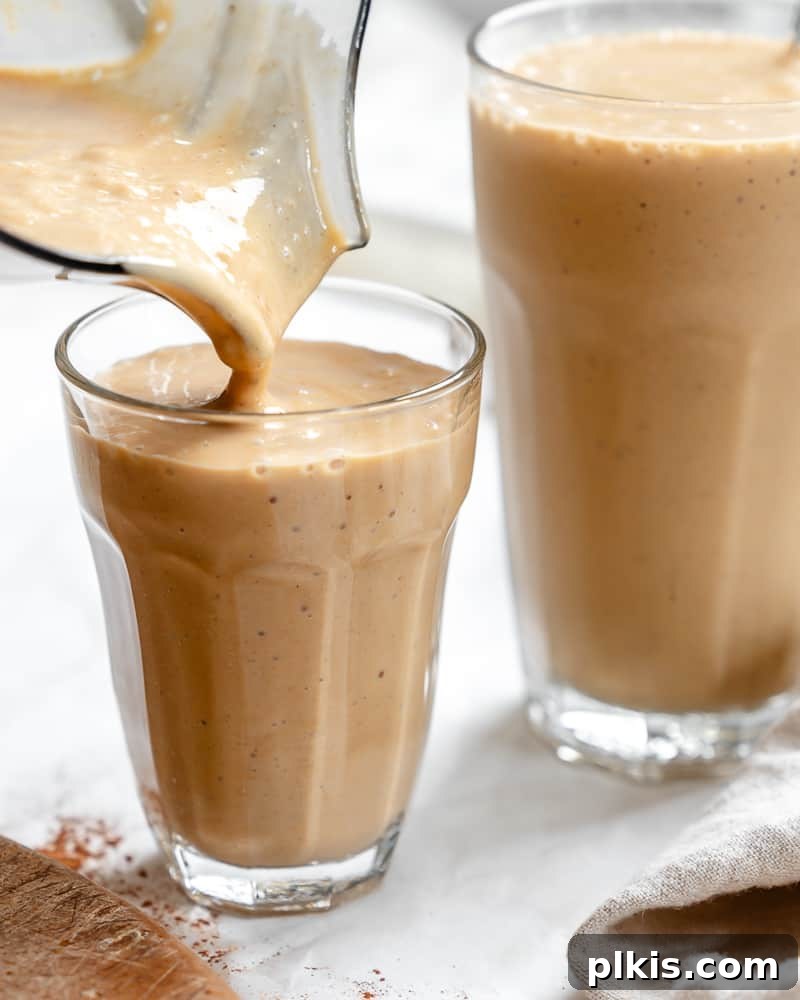 Golden Harvest Smoothie 2 completed Sweet Potato Smoothie in two cups, garnished with cinnamon