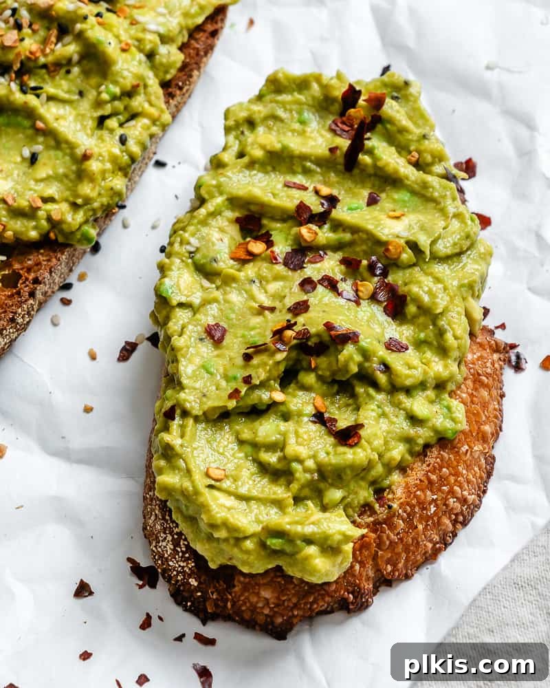 completed Best Vegan Avocado Toast on white surface