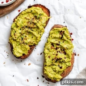 completed Best Vegan Avocado Toast on white surface