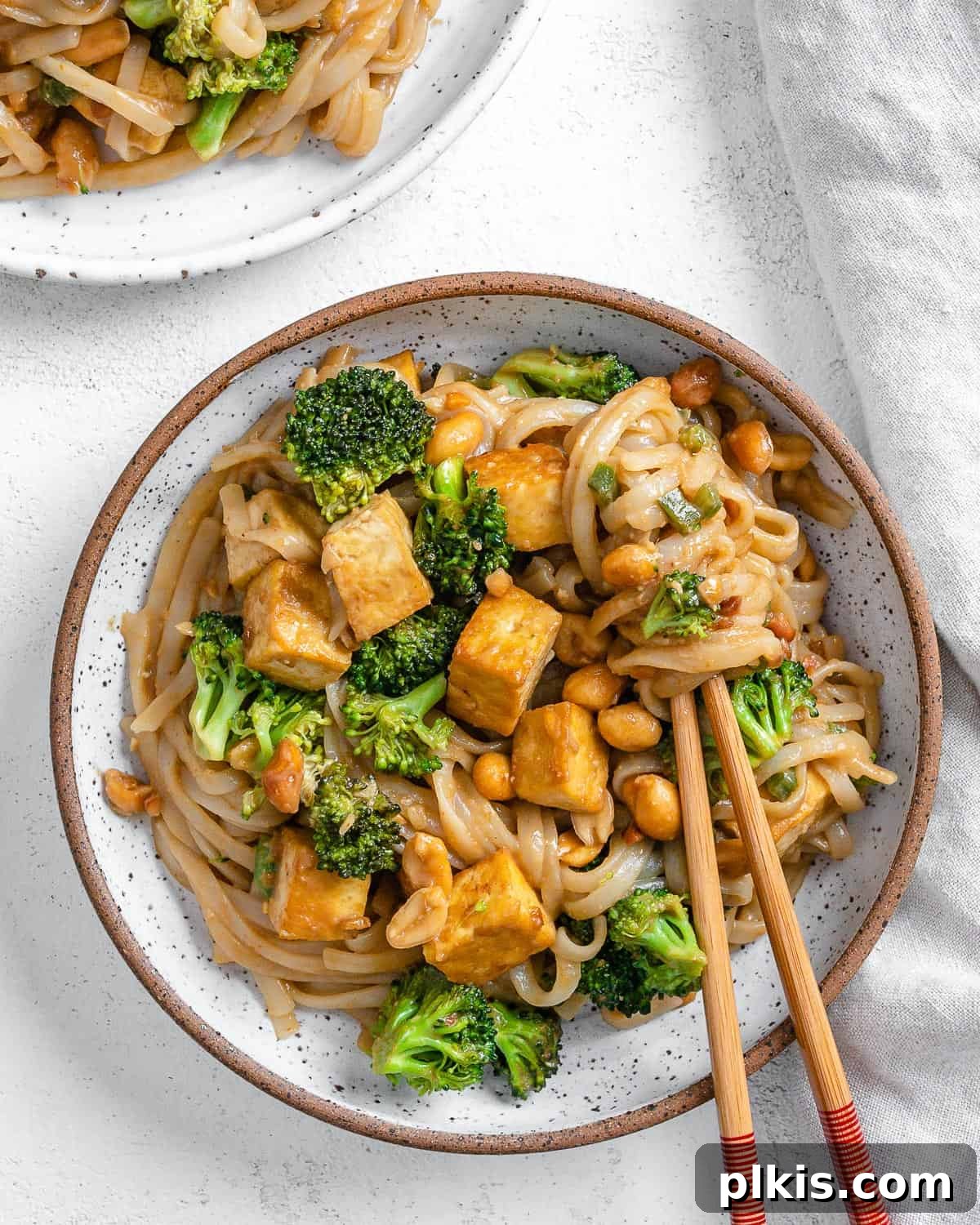 Traditional Tofu Pad Thai 2 completed tofu pad thai on a plate against a light surface