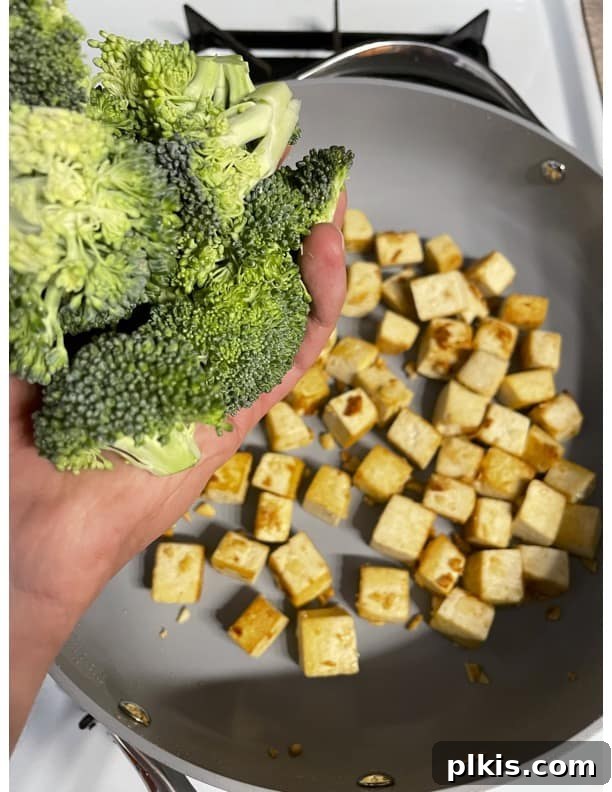 Traditional Tofu Pad Thai 11 process of adding broccoli to pan