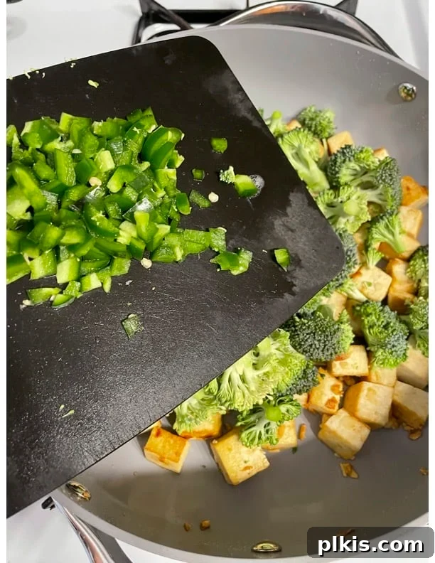 Traditional Tofu Pad Thai 12 process of adding jalapeno to pan