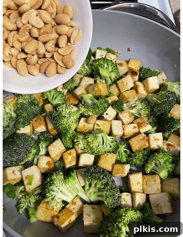 Traditional Tofu Pad Thai 13 process of adding peanuts to pan