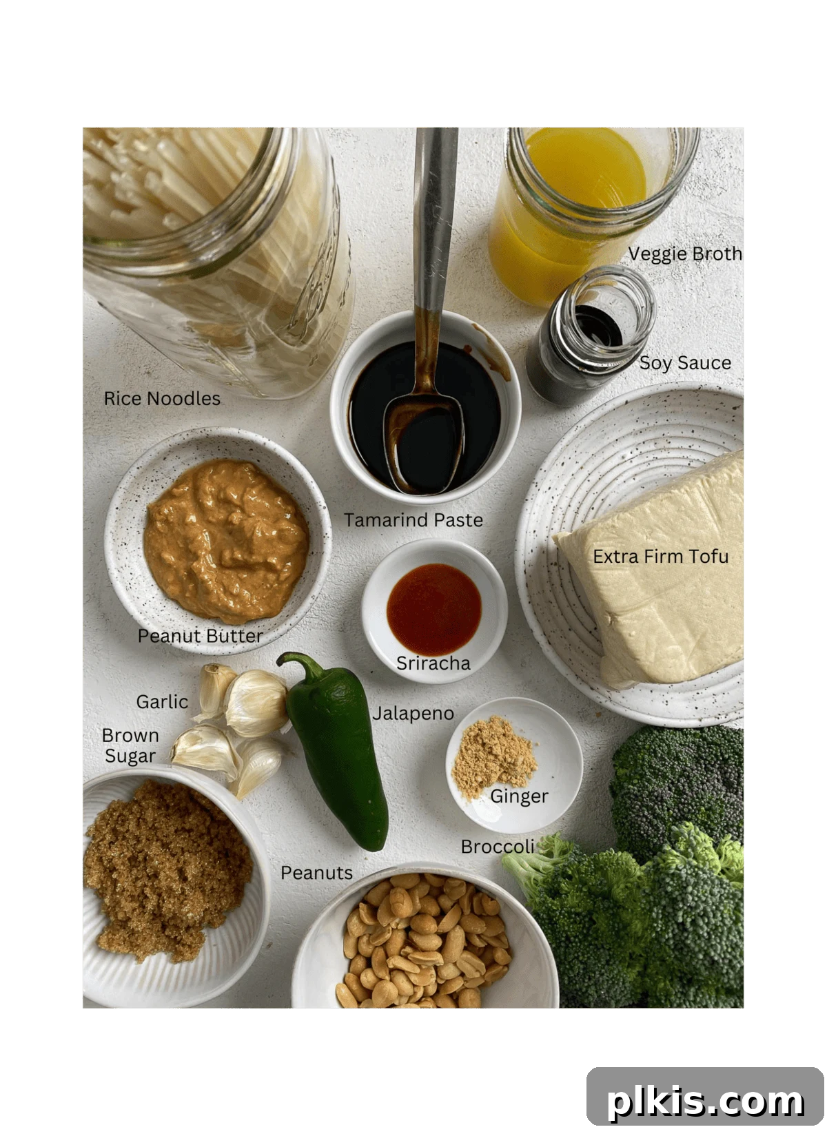 Traditional Tofu Pad Thai 3 ingredients for Tofu Pad Thai measured out against a white surface