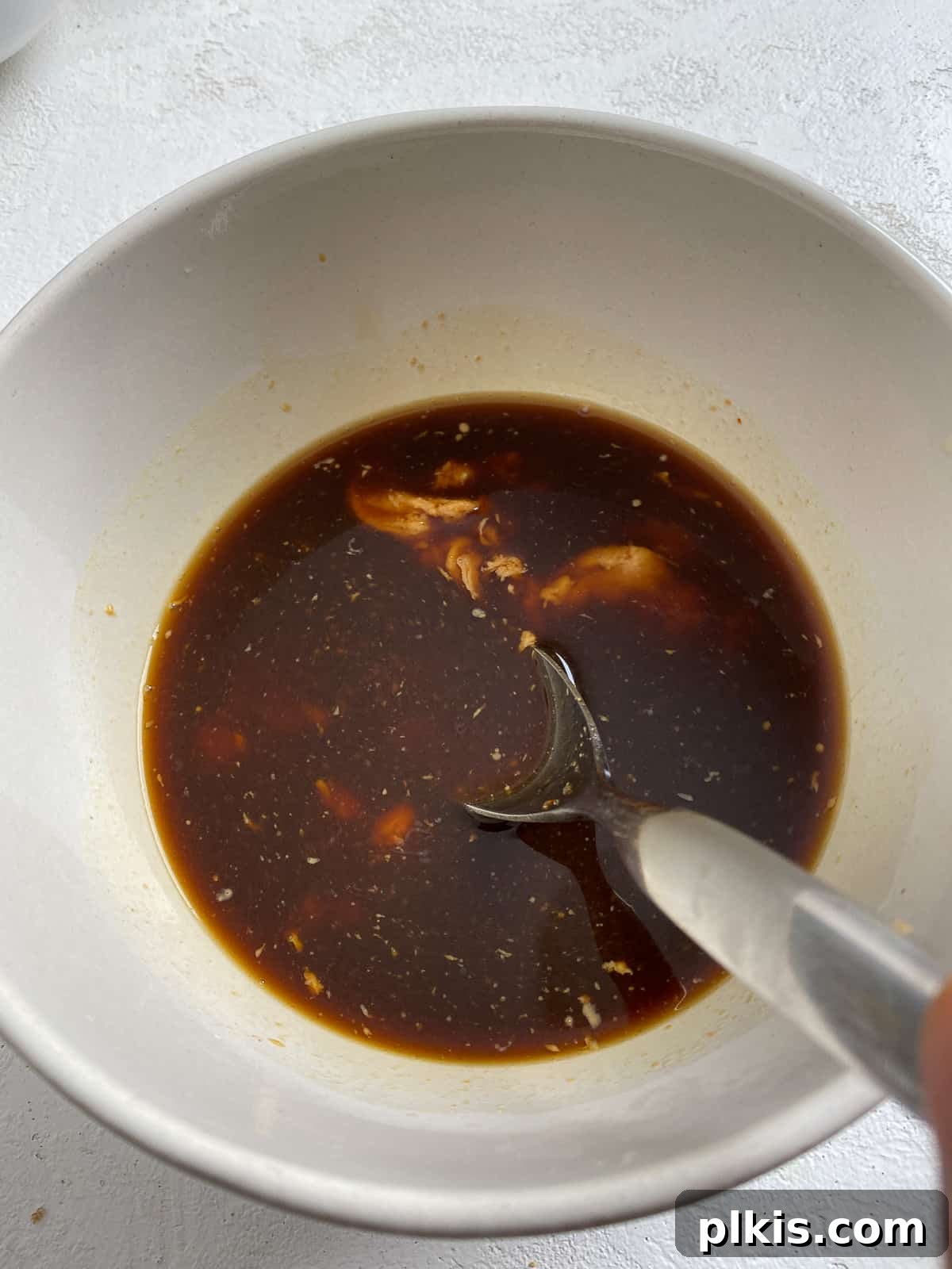 Traditional Tofu Pad Thai 6 process shot of mixing sauce ingredients together in a bowl