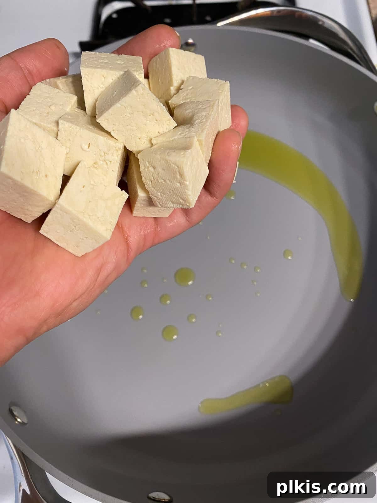 Traditional Tofu Pad Thai 8 process of adding tofu to pan