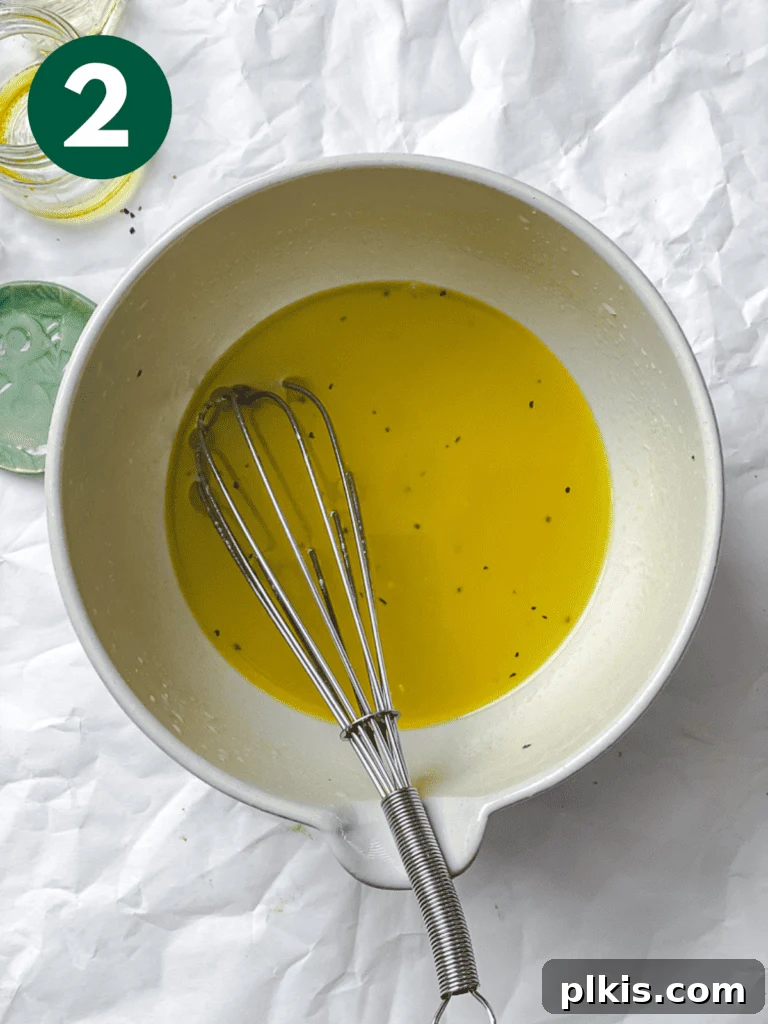 Vibrant Ginger Dressing 5 process shot of stirring Ginger Salad Dressing ingredients in a bowl