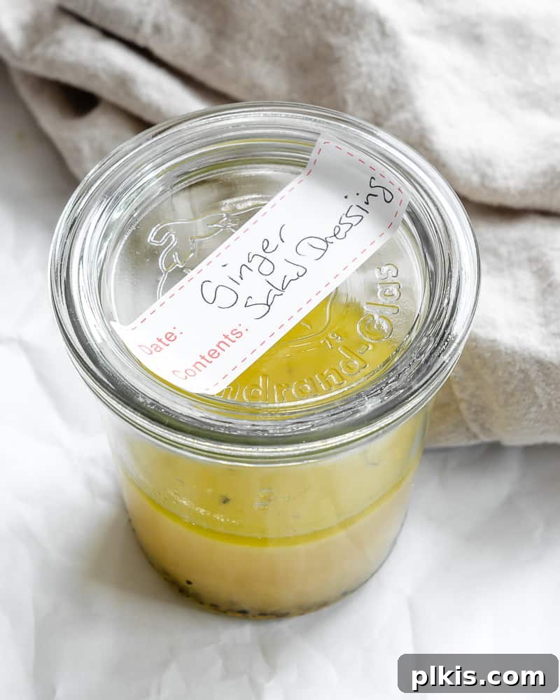 Vibrant Ginger Dressing 7 completed Ginger Salad Dressing in a storage container