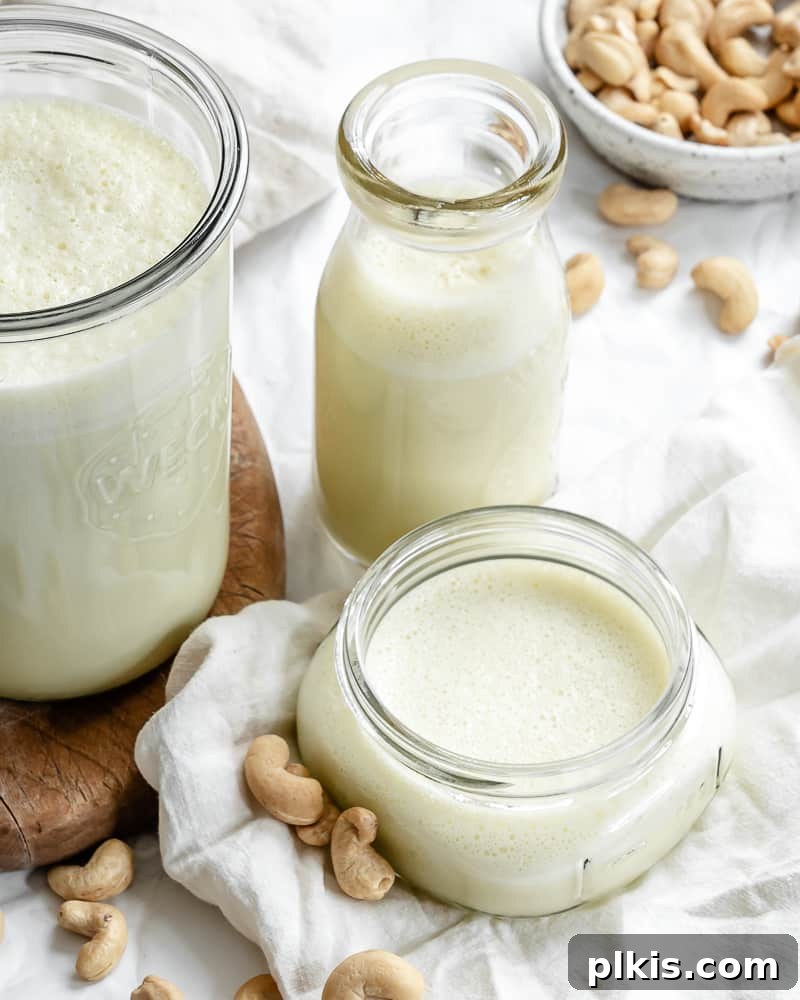 Plant-Based Alfredo Bliss 2 3 glass jars filled with vegan alfredo sauce.