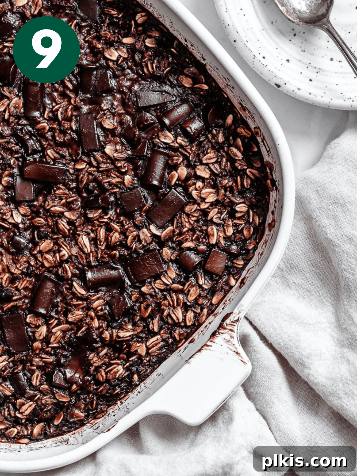 Decadent Chocolate Baked Oats: Smooth or Hearty 12 A freshly baked dish of Chocolate Baked Oatmeal, showing a firm, moist texture with melted chocolate, ready to be served