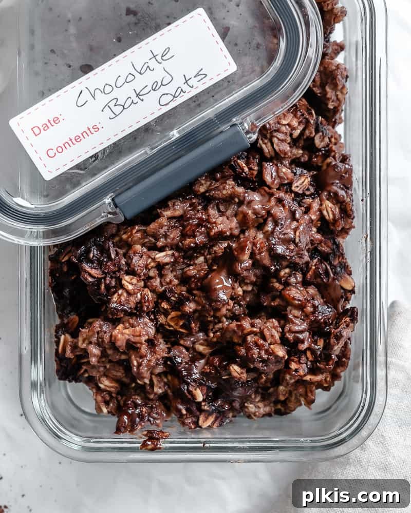 Decadent Chocolate Baked Oats: Smooth or Hearty 14 Portions of Chocolate Baked Oatmeal stored neatly in glass meal-prep containers, ready for the week