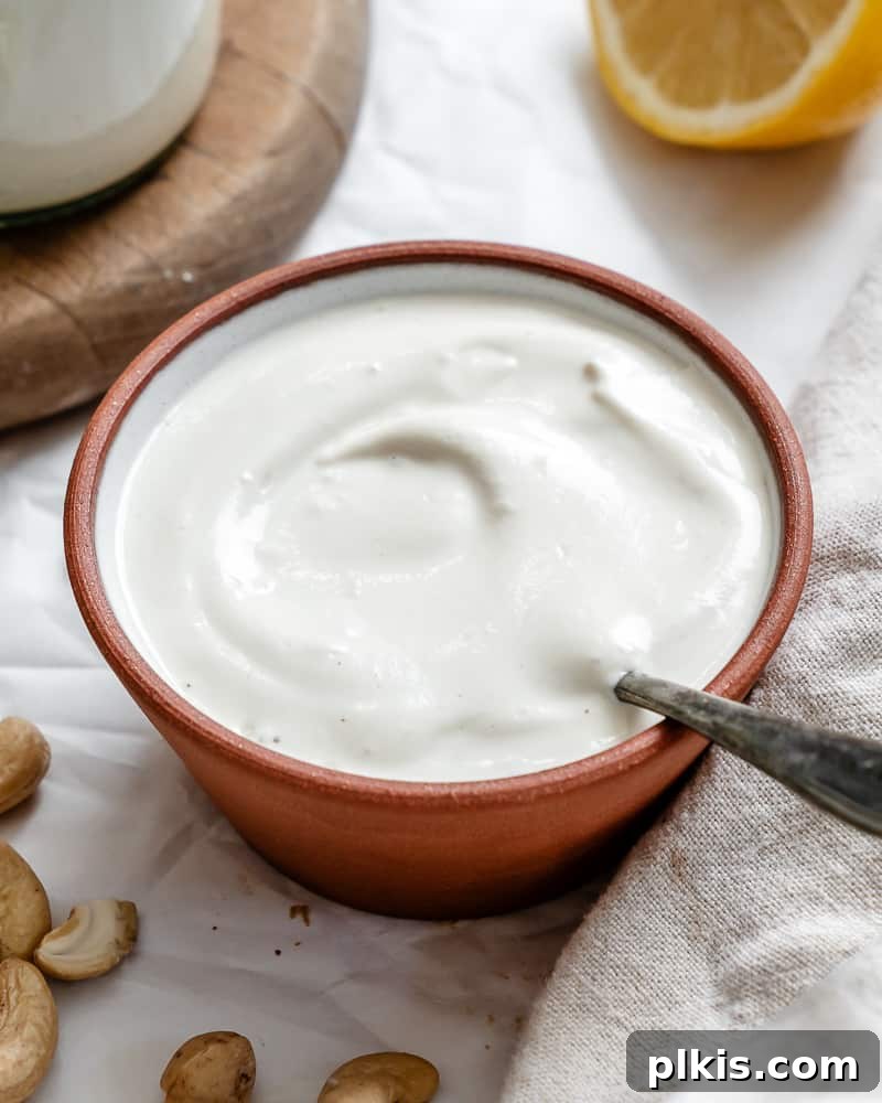 Silky Cashew Cream 8 creamy white cashew cream in a small bowl, ready to be served.