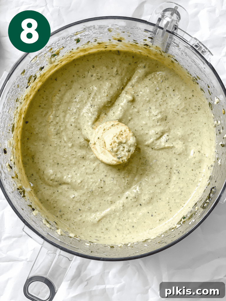 Hearty Vegan Eggplant Lasagna 11 Smooth and creamy tofu ricotta, blended to perfection in a food processor, showcasing its rich texture.