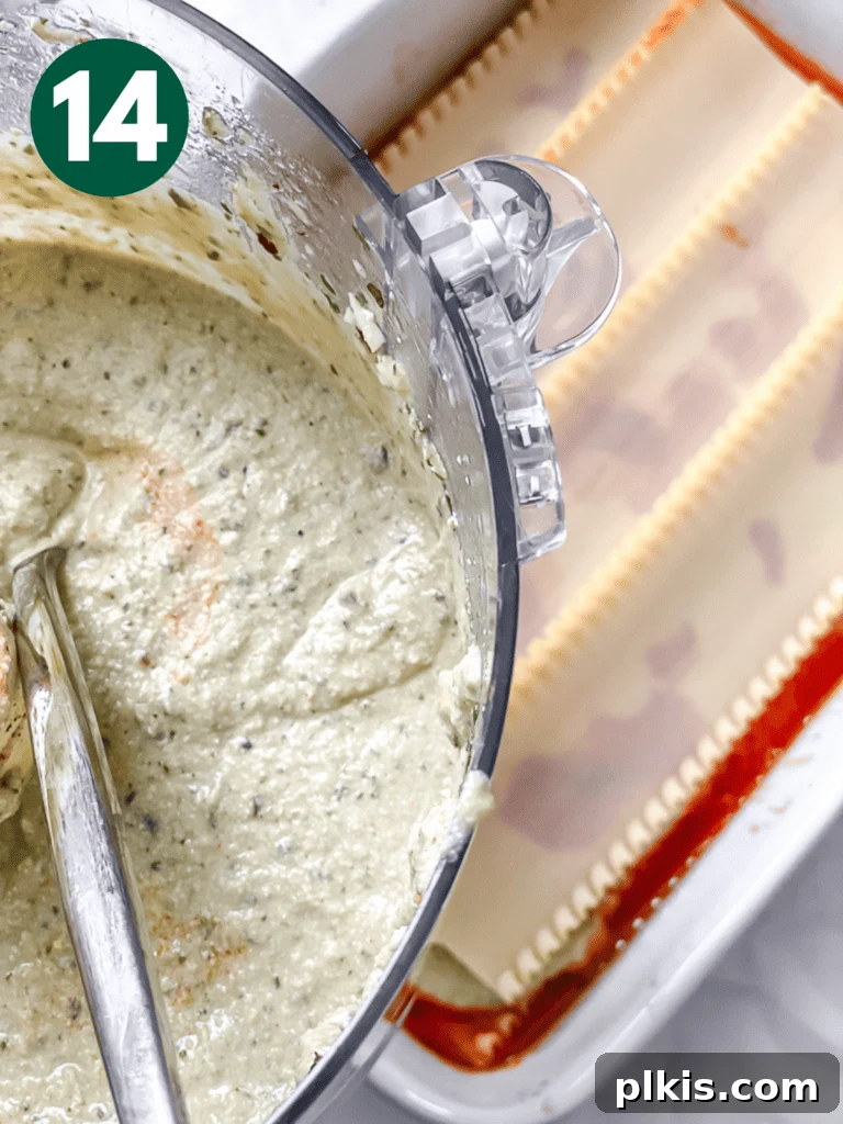 Hearty Vegan Eggplant Lasagna 17 Another layer of creamy tofu ricotta spread generously across the lasagna noodles.