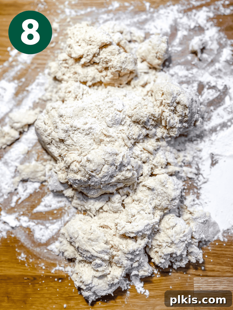 Plant-Powered Irish Soda Bread 11 Process shot showing dough turned onto a floured cutting board.