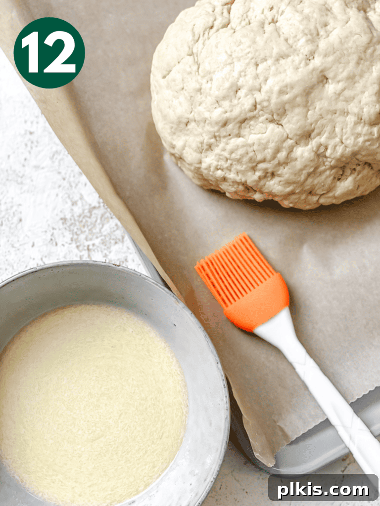 Plant-Powered Irish Soda Bread 15 Process shot showing the dough ball alongside the basting mixture.