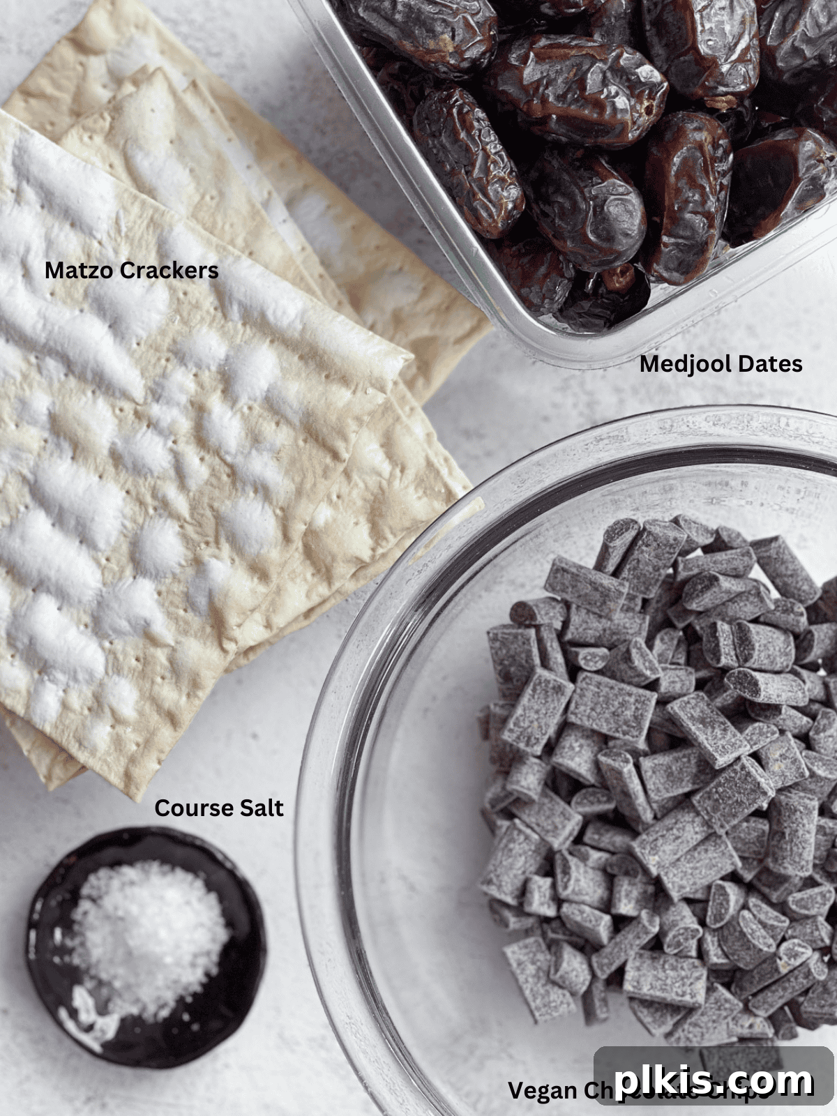 Crispy Matzo Toffee 3 A collection of ingredients for making Matzo Bark, including dates, peanut butter, matzo, and chocolate chips.