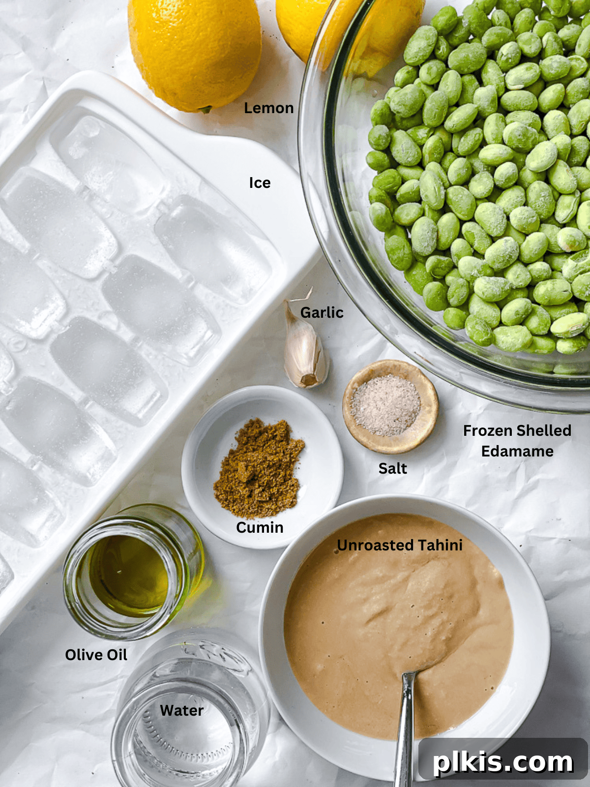 Emerald Edamame Delight 3 ingredients for Edamame Hummus measured out on a white surface
