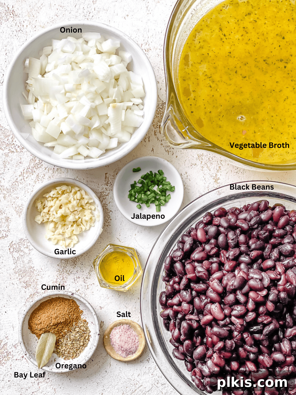 Spiced Black Bean Warmth 3 ingredients for black bean soup in individual bowls with labels.