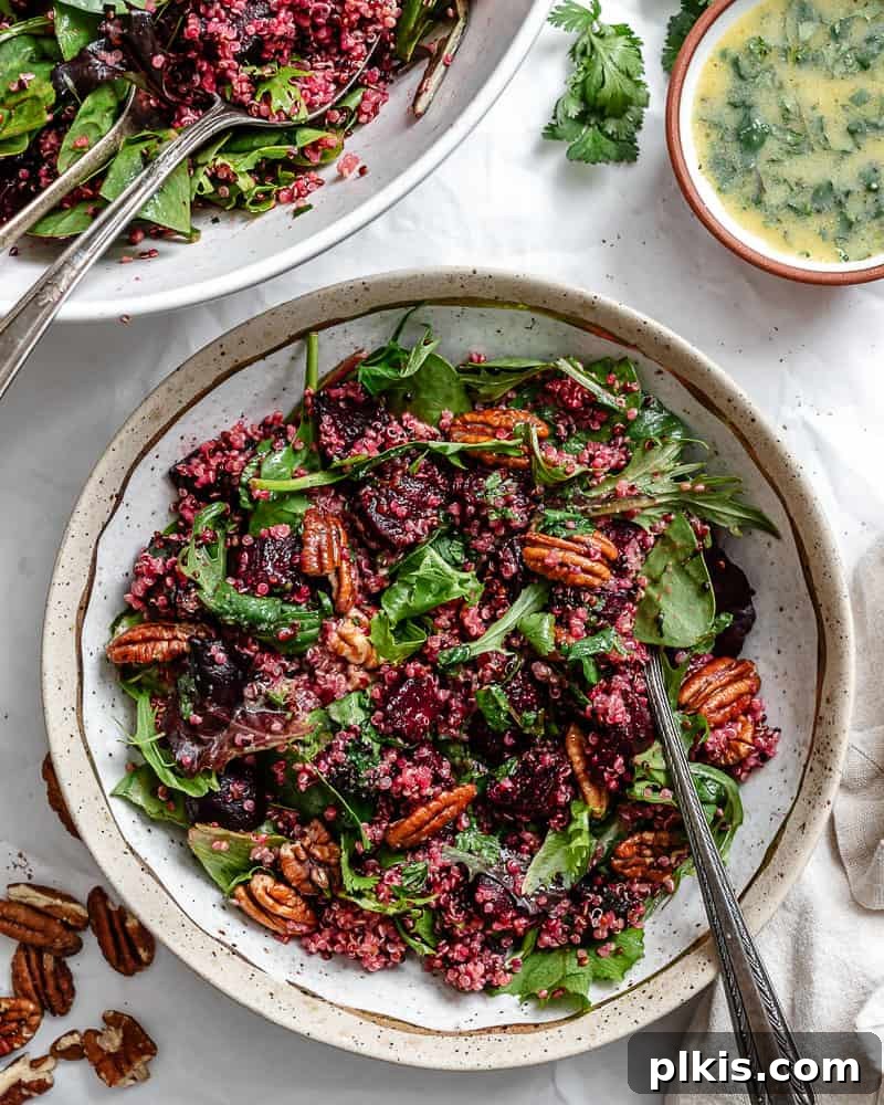 Vibrant Roasted Beet & Quinoa Medley 2 Completed Roasted Beet and Quinoa Salad plated, showcasing vibrant colors and textures.