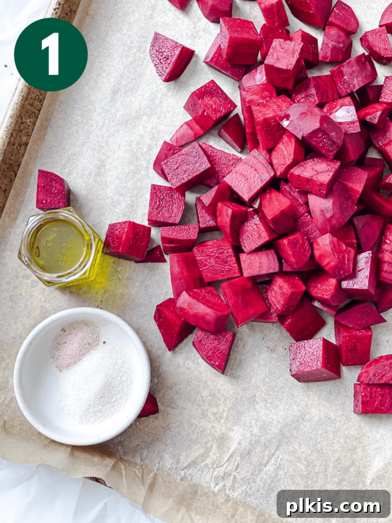 Vibrant Roasted Beet & Quinoa Medley 4 Process shot showing chopped beets on a baking tray, ready for roasting.